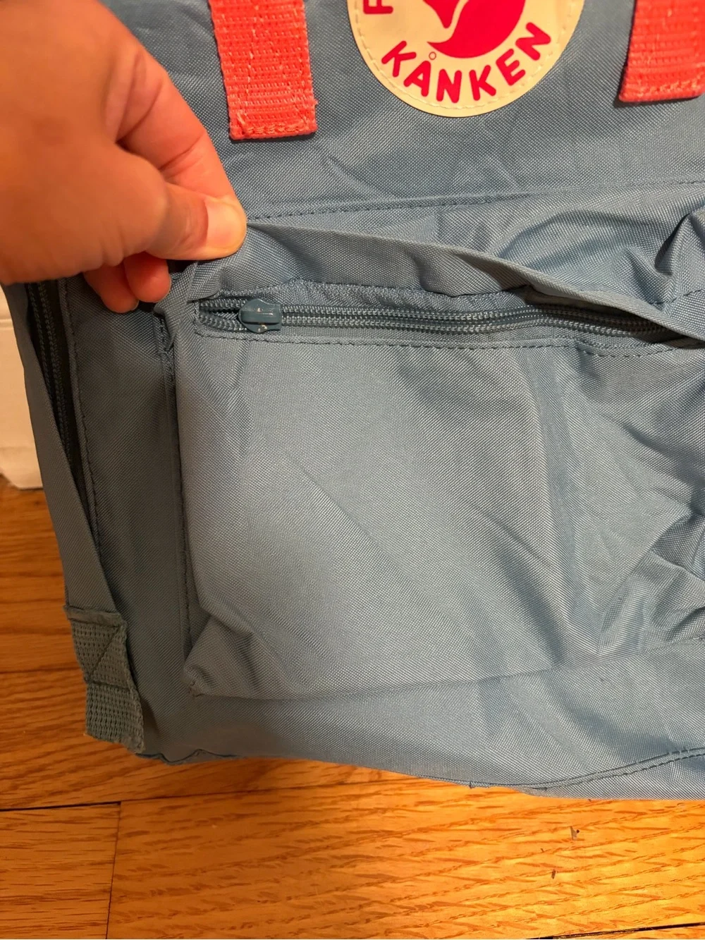 Fjallraven Kånken Blue Backpack with Coral Handles